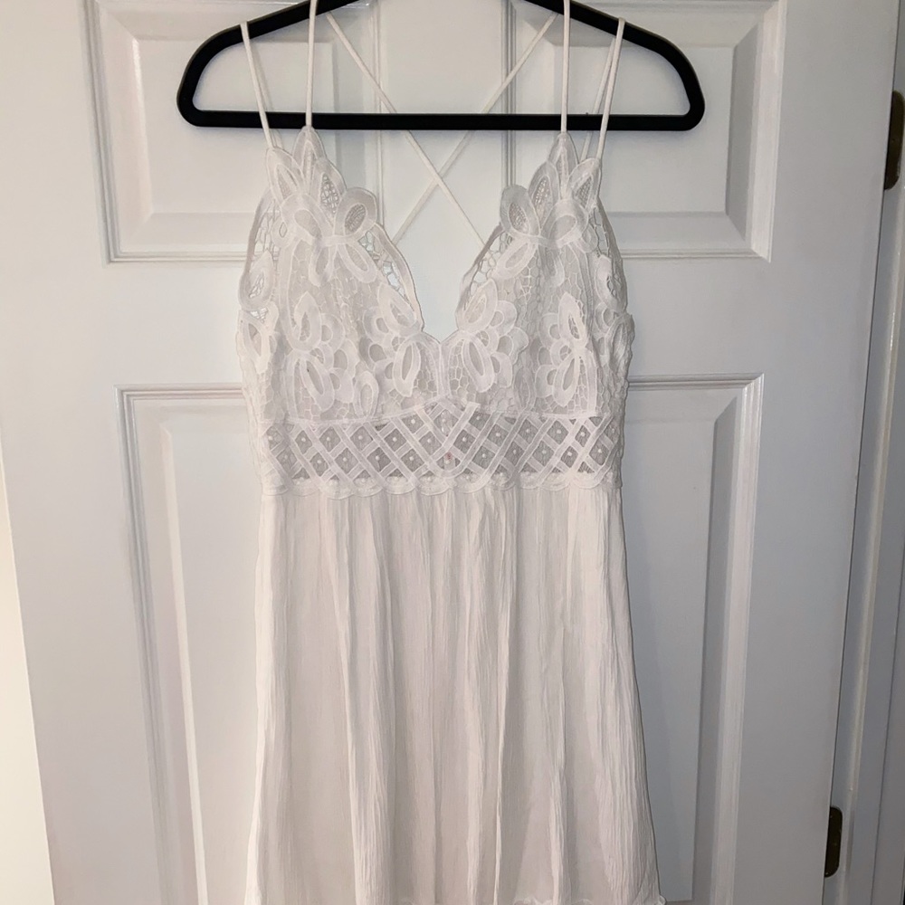 Flowy white lace top dress